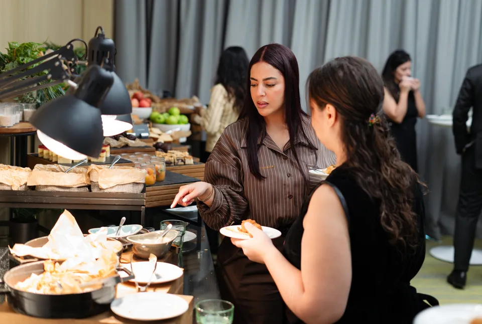 Guests at the refreshments buffet during the Dubai Property Expo